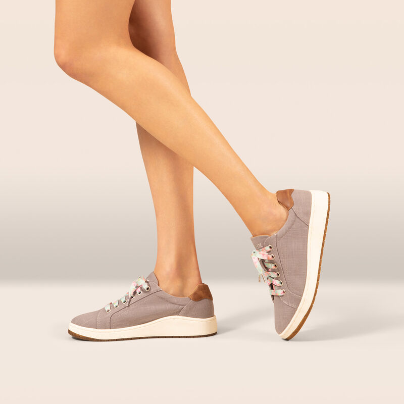 grey canvas sneaker on foot